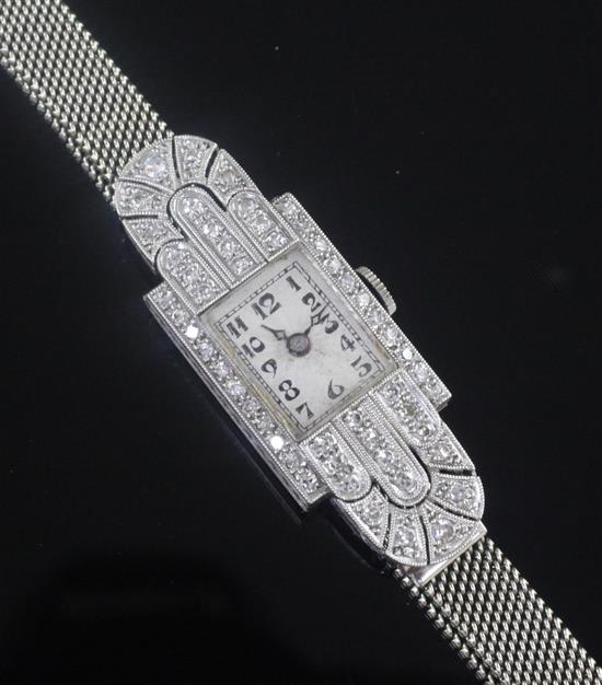 A 1930s Art Deco platinum and diamond manual wind cocktail watch,